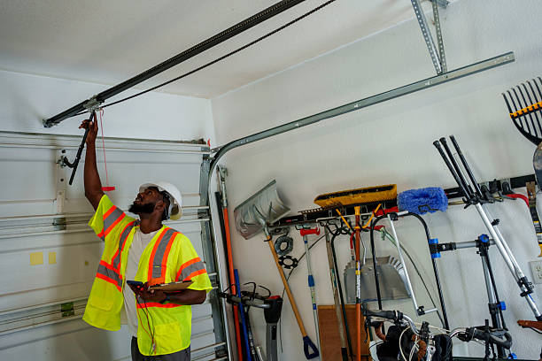 Professional Garage Door Panel Replacement technician working in Wells County County, IN